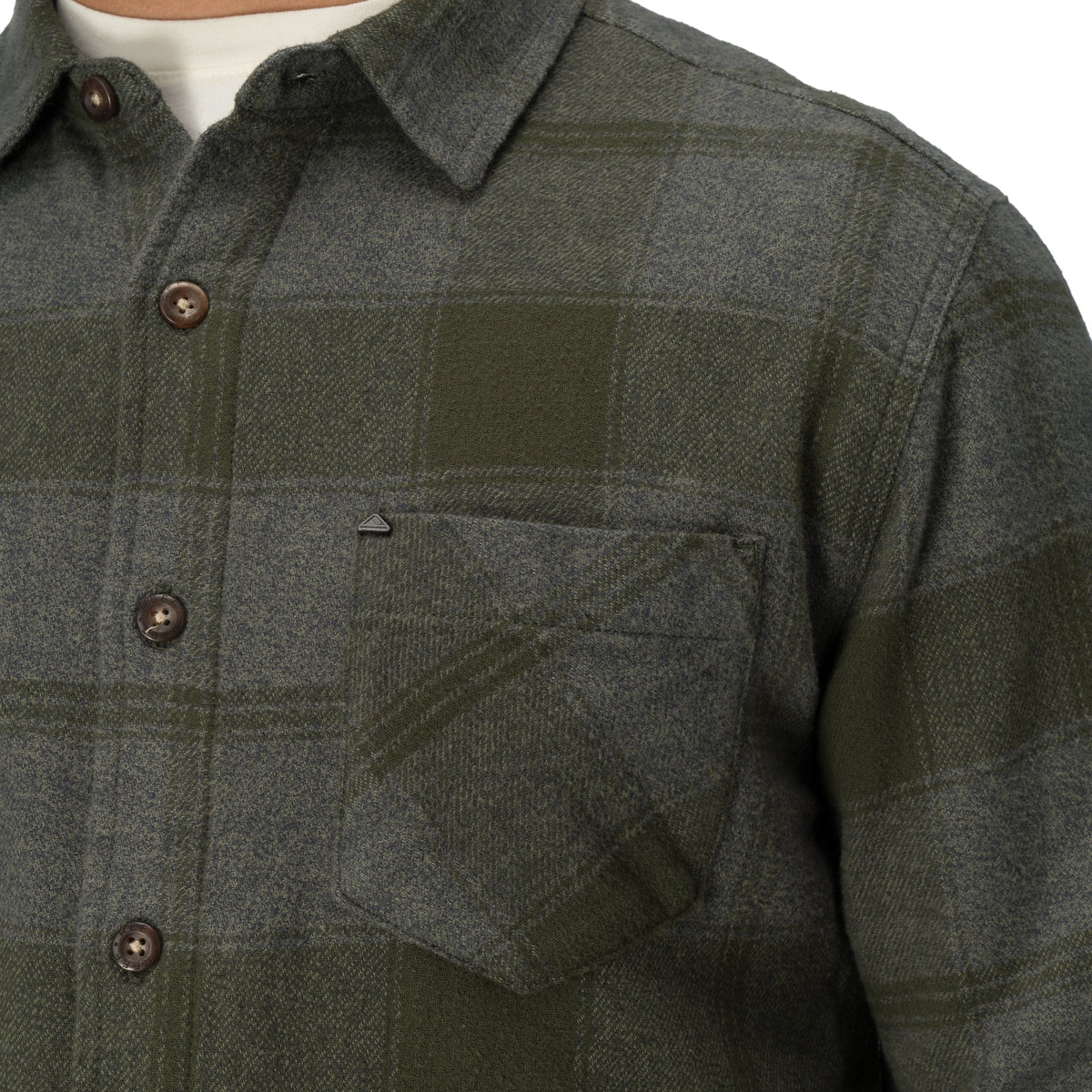 Close-up of Reggie Flannel Shirt chest pocket and buttons, showcasing soft, rugged surf-inspired comfort from StoreRank.ai All Products.