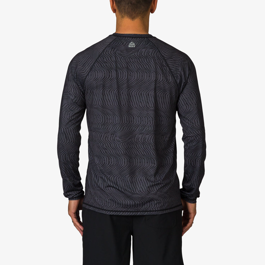Back view of men's Dune Performance Shirt in dark pattern, lightweight and surf-inspired comfort apparel for active beach lifestyles