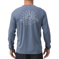 Back view of men’s Set In Performance Shirt in blue with sun skull graphic, designed for beach comfort and durability.