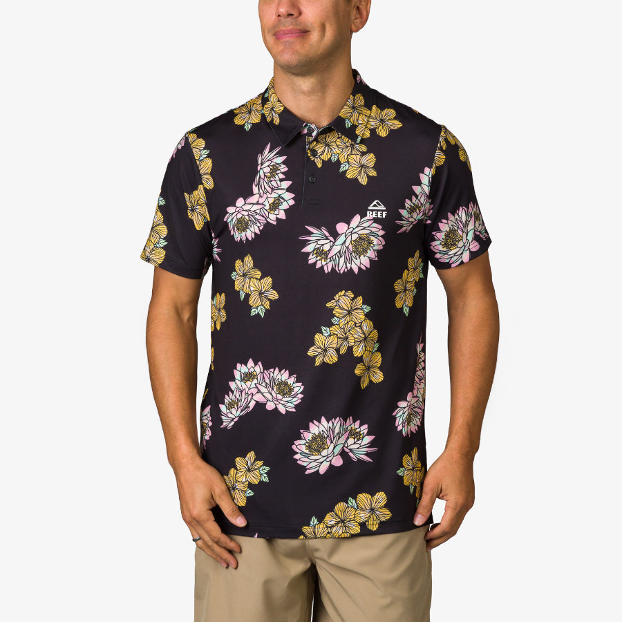 Man wearing a Wesland Polo with floral print, front view, designed for beach and active lifestyles, comfort-focused fit.
