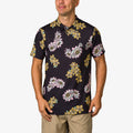 Man wearing a Wesland Polo with floral print, front view, designed for beach and active lifestyles, comfort-focused fit.