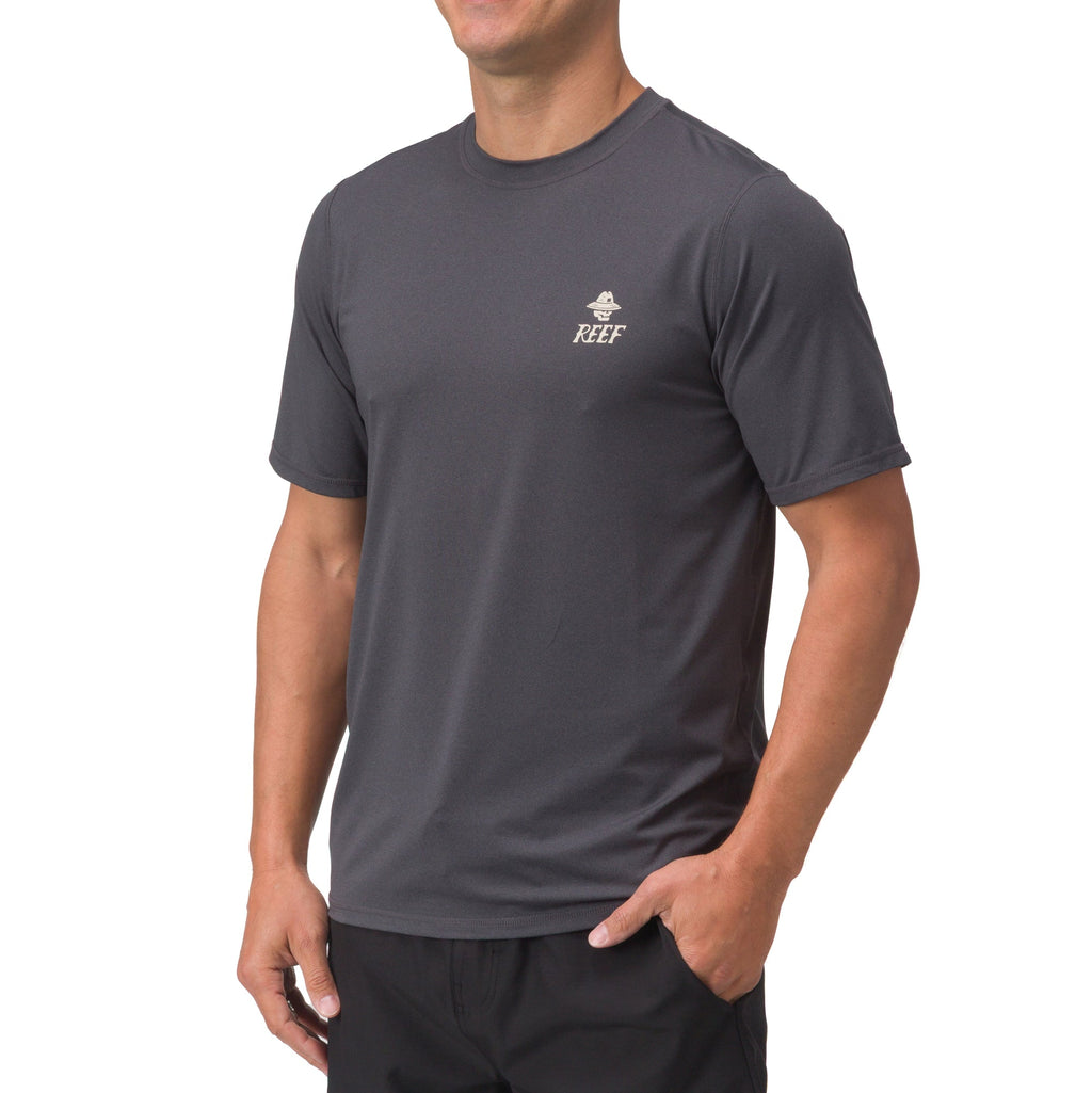 Men's Siesta Performance Shirt front view in dark gray, surf-inspired comfort apparel for active beach lifestyles.