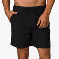 Men's black Rushmore Hybrid Short front view showing adjustable drawstring waist and pockets for comfort and beach use.