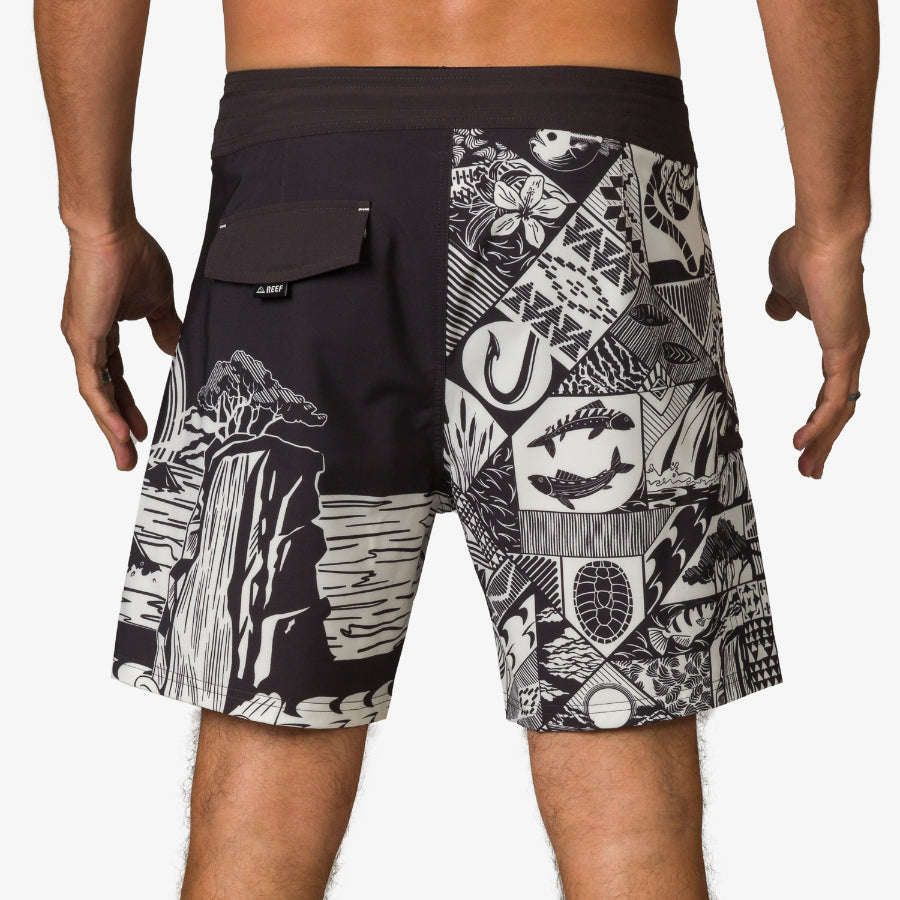 Rear view of men's Marshall Boardshort featuring black and white patchwork design, lightweight and water-friendly fabric for beach comfort.