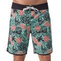 Front view of men's Fayder Boardshort with turquoise and coral floral pattern and black waistband, surf-inspired comfort.