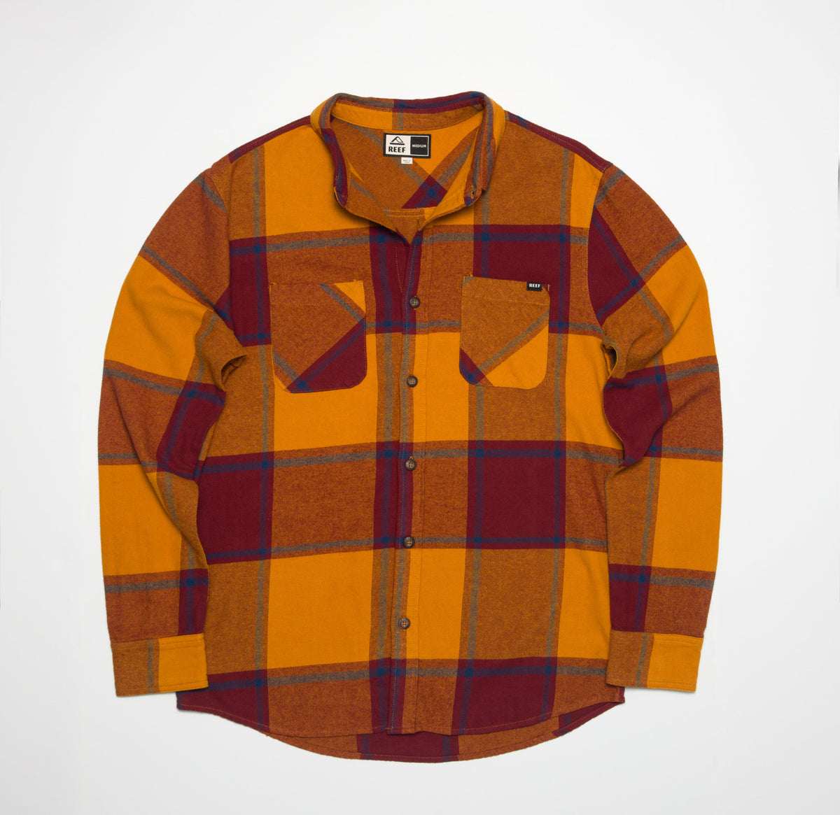 Flat lay of Morris Ls Wvn Shirt in orange and maroon plaid, comfort-focused men's apparel for beach and active lifestyles.