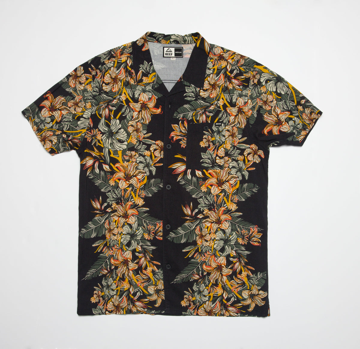 Drift Ss Camp Shirt with black base and vibrant orange floral print, short sleeves, and relaxed beach-inspired fit.