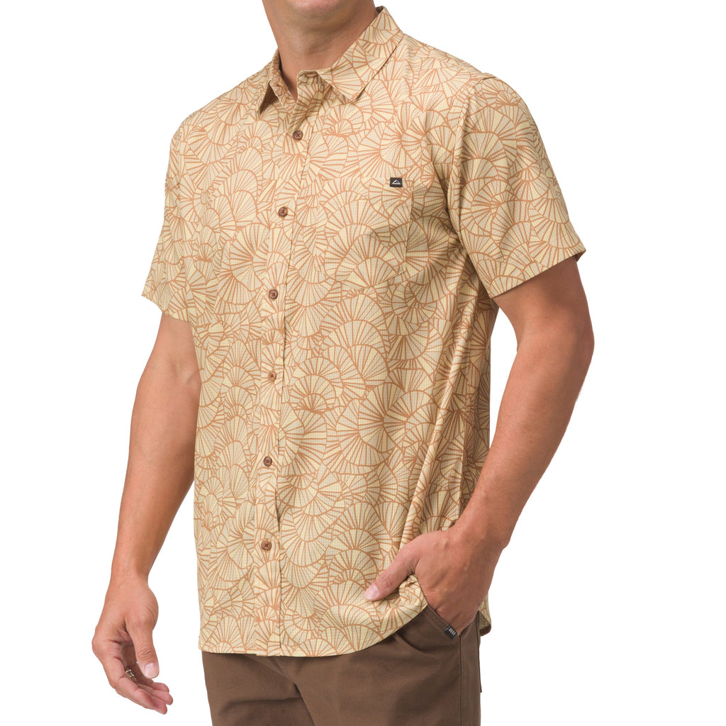 Man wearing a front view of the Hartman Woven Shirt with beige and orange surf-inspired pattern, short sleeves, and button front.