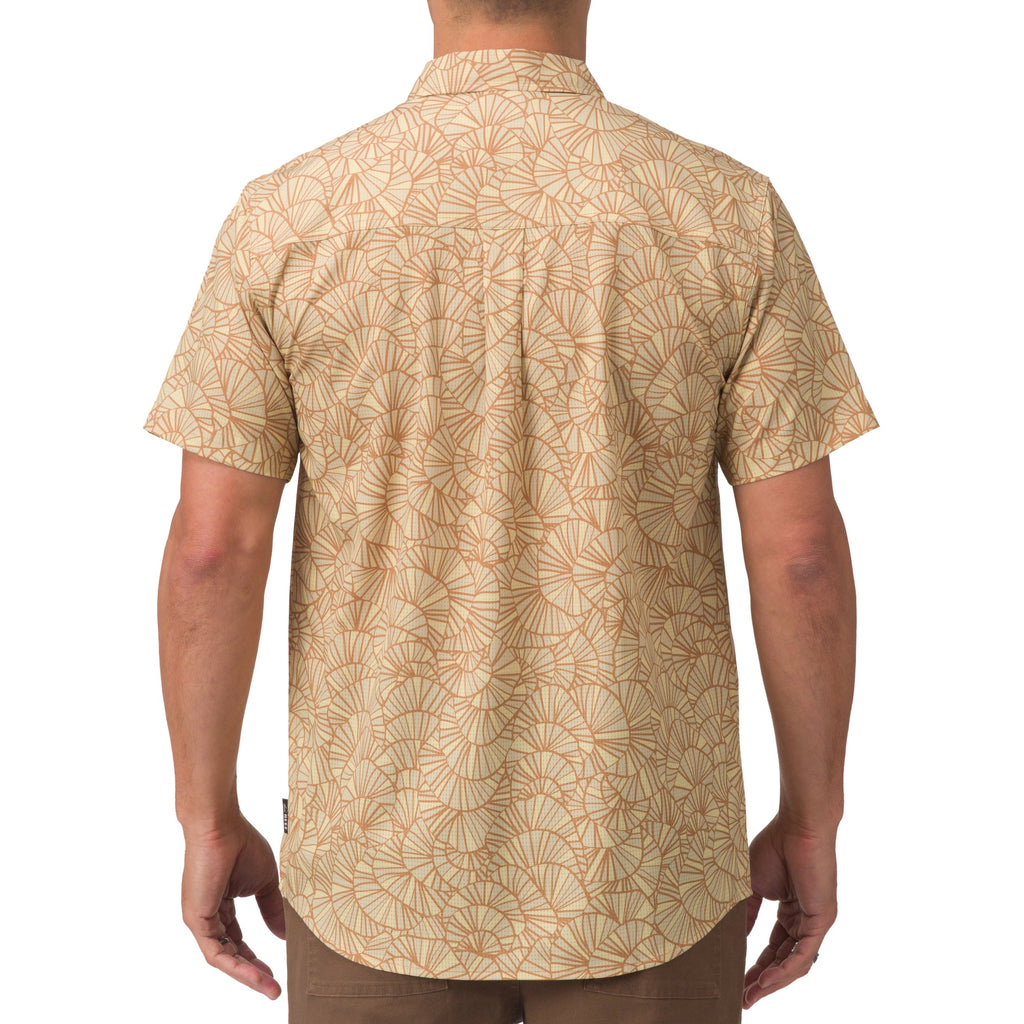 Hartman Woven Shirt shown from back on male model, featuring a beach-inspired pattern and comfortable fit for active lifestyles.