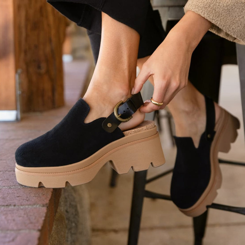 Vista Luxe Solene close-up showing left shoe side with adjustable strap and chunky sole, designed for all-day comfort.