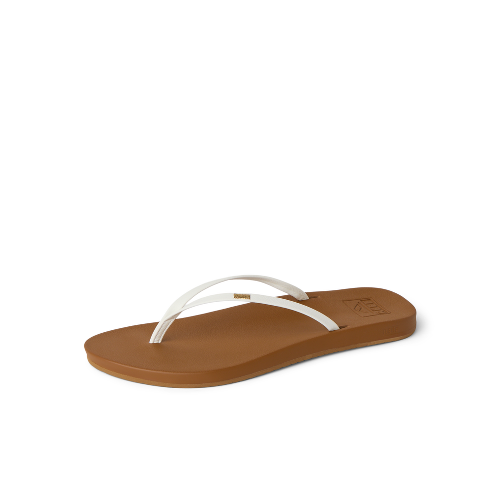 Cushion Slim women's sandal facing right, white straps with tan cushioned footbed, surf-inspired comfort and arch support.