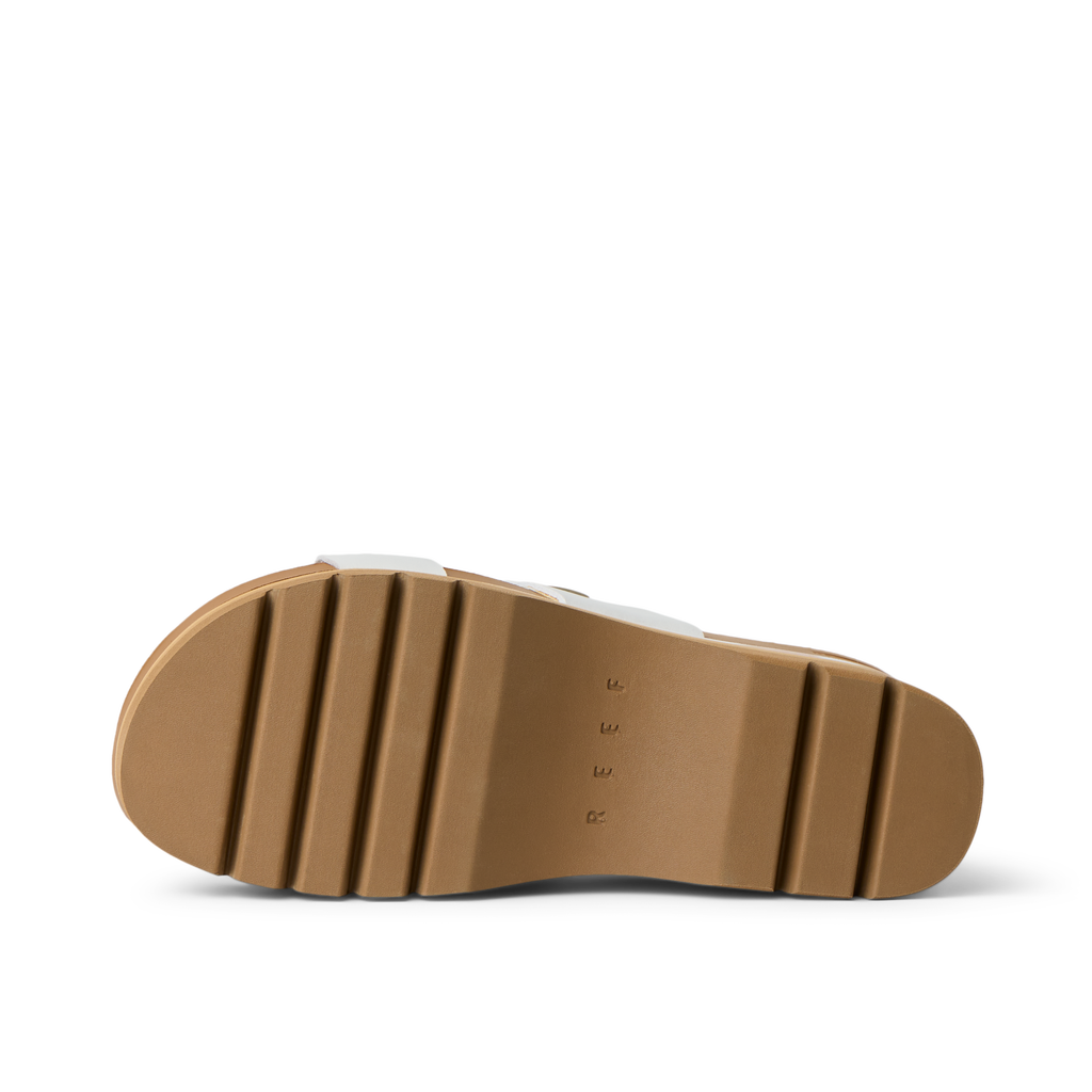 Cushion Vista Higher showing the outsole facing up with durable, water-friendly rubber and comfort-focused design.