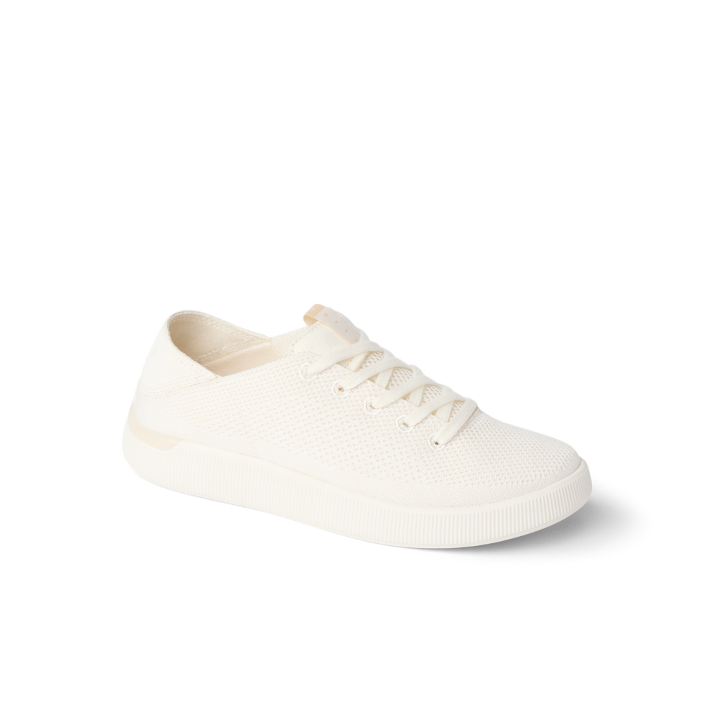 Reef Neptune women's cream knit sneaker facing right, featuring soft cushioning and anatomical arch support.