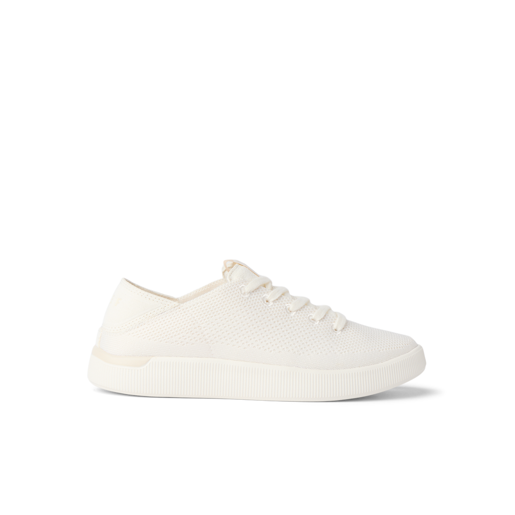 Reef Neptune women's cream knit sneaker facing right, featuring water-friendly materials and cushioned comfort.