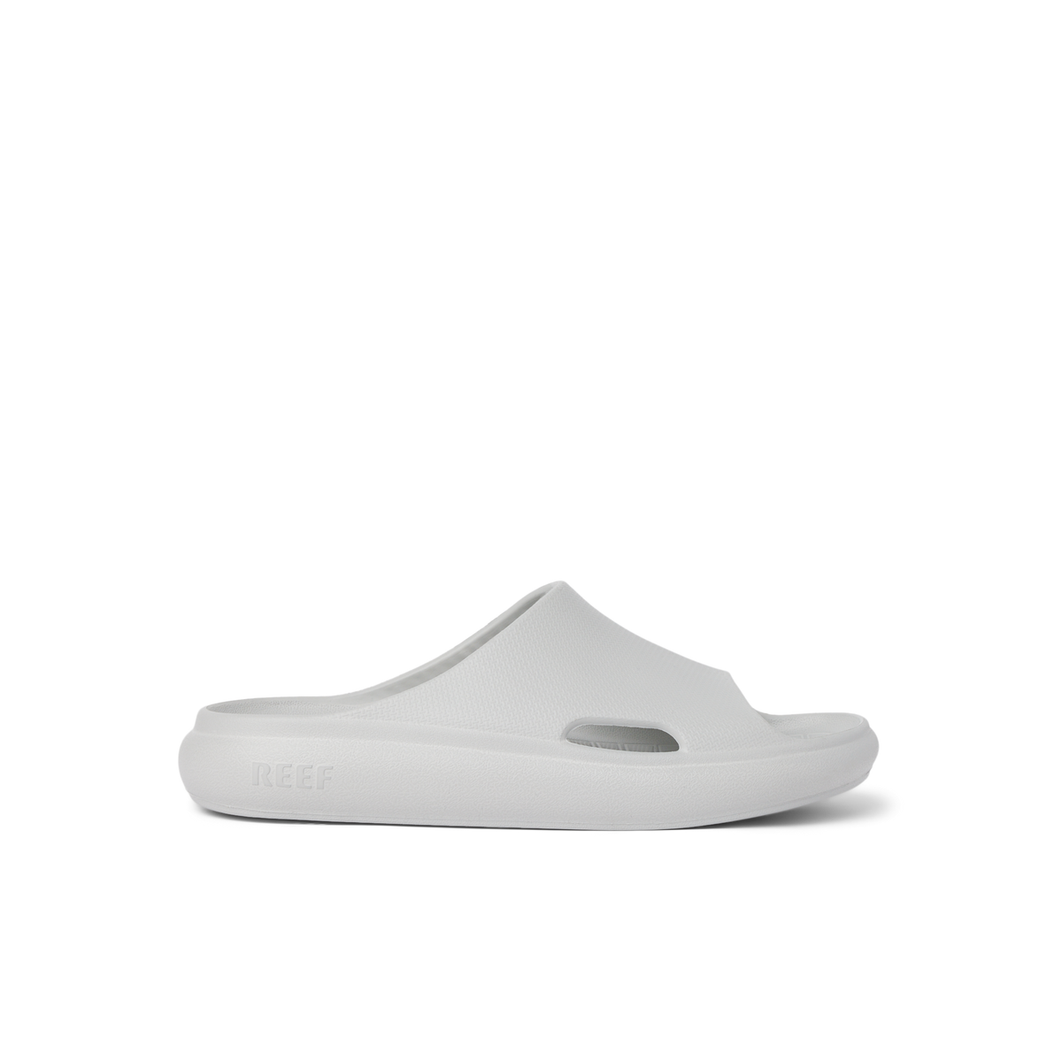 Kids Rio Slide in light grey facing right, close-up side view showcasing lightweight, water-friendly, cushioned slide for kids.