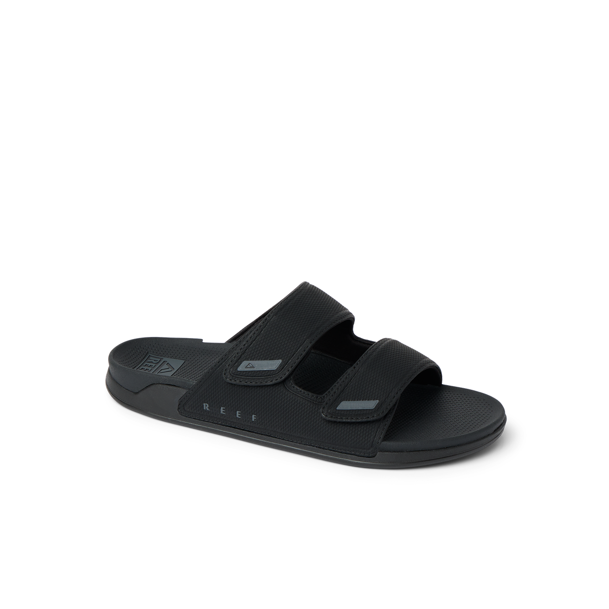 Phantom Tradewind men’s black sandal facing right, featuring dual straps with anatomical arch support and soft cushioning.