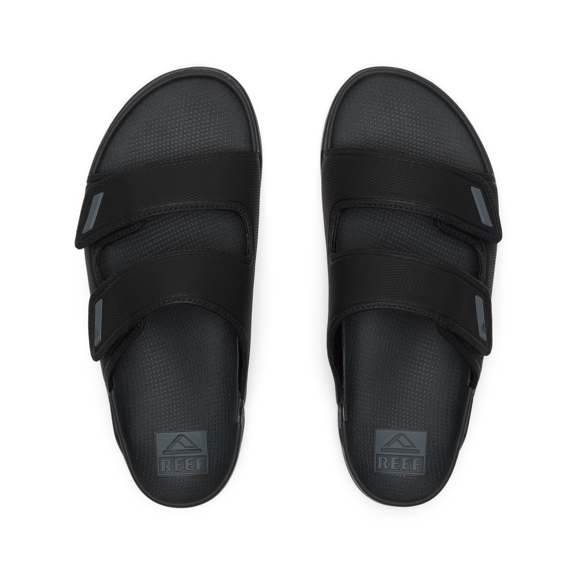 Top view of black Phantom Tradewind men's sandals with dual straps, soft cushioning, and anatomical arch support for beach comfort.