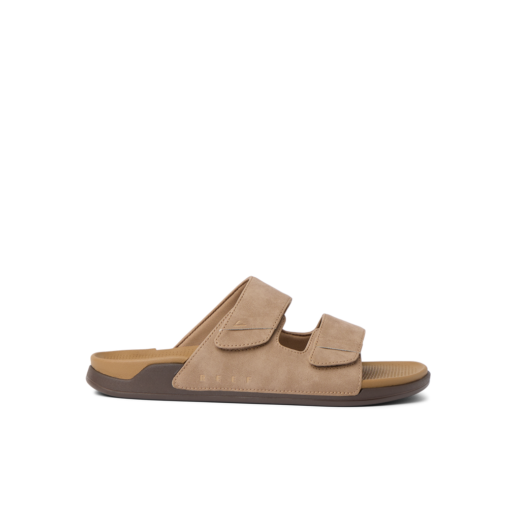 Phantom Tradewind tan sandal facing right with adjustable straps, cushioned footbed, and arch support for beach comfort