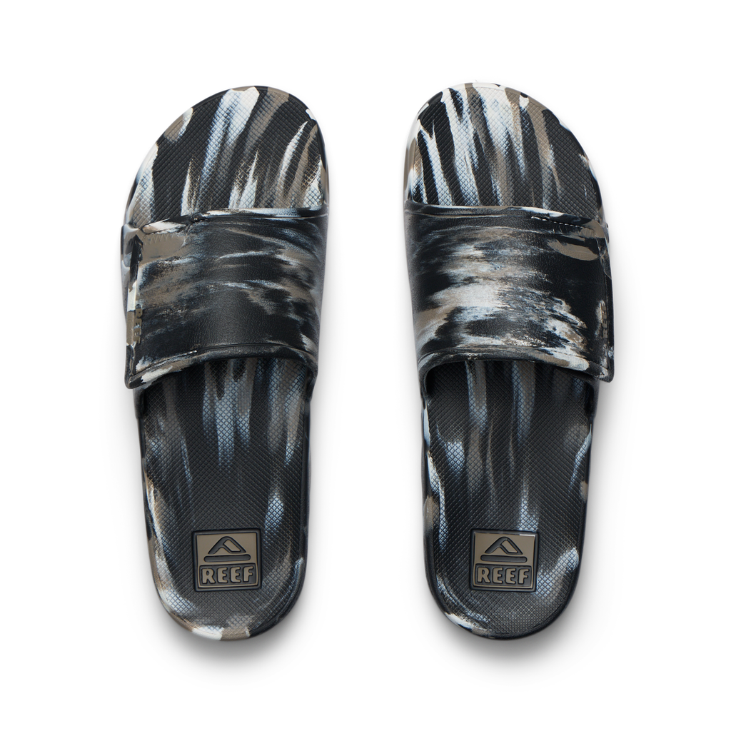 Top view of Fanning Slide H2O men's water-friendly slides with cushioned footbeds and camo marble pattern facing upward.