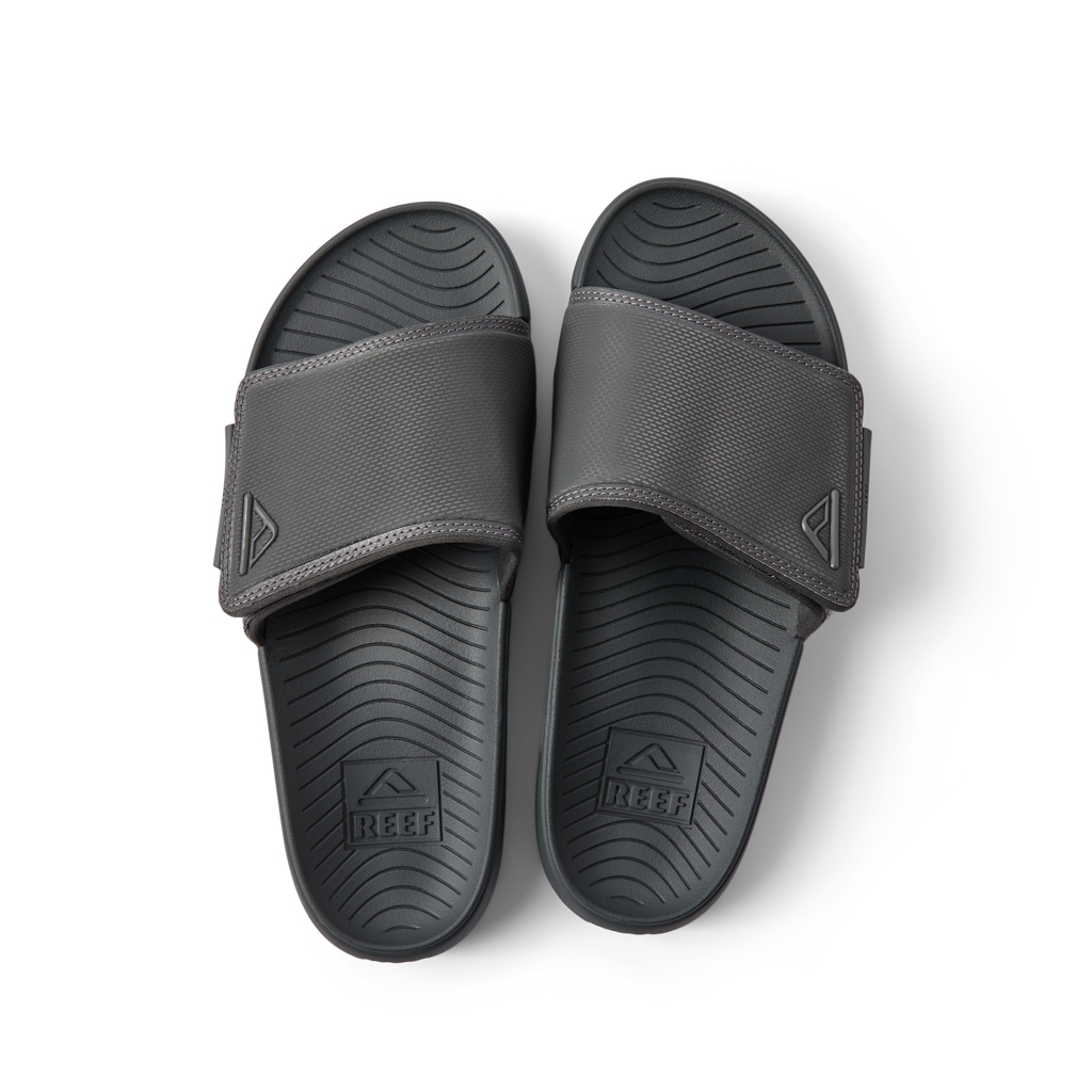 Top view of black Phantom Slab men's slides facing upward, featuring soft-rebound cushioning and anatomical arch support.