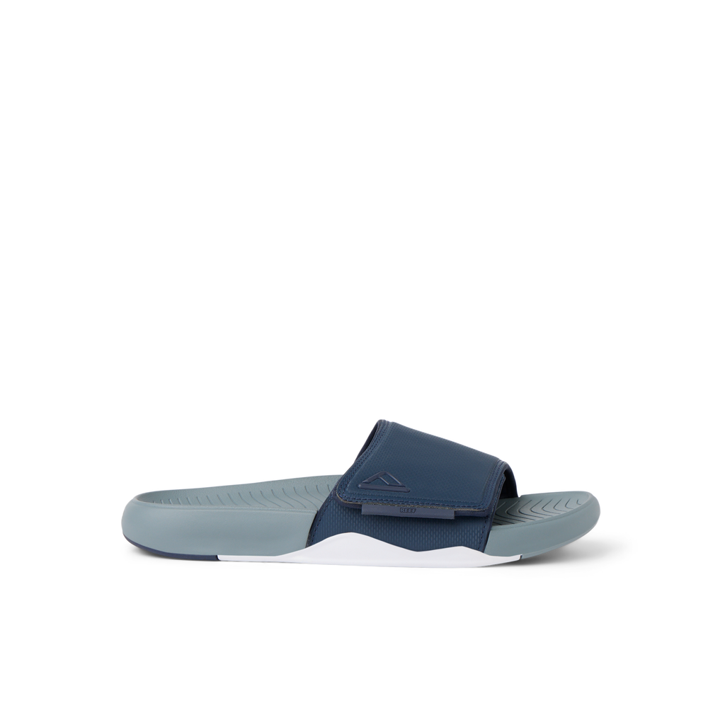 Phantom Slab men's slide sandal facing right, beach-inspired with arch support and soft-rebound cushioning for comfort.