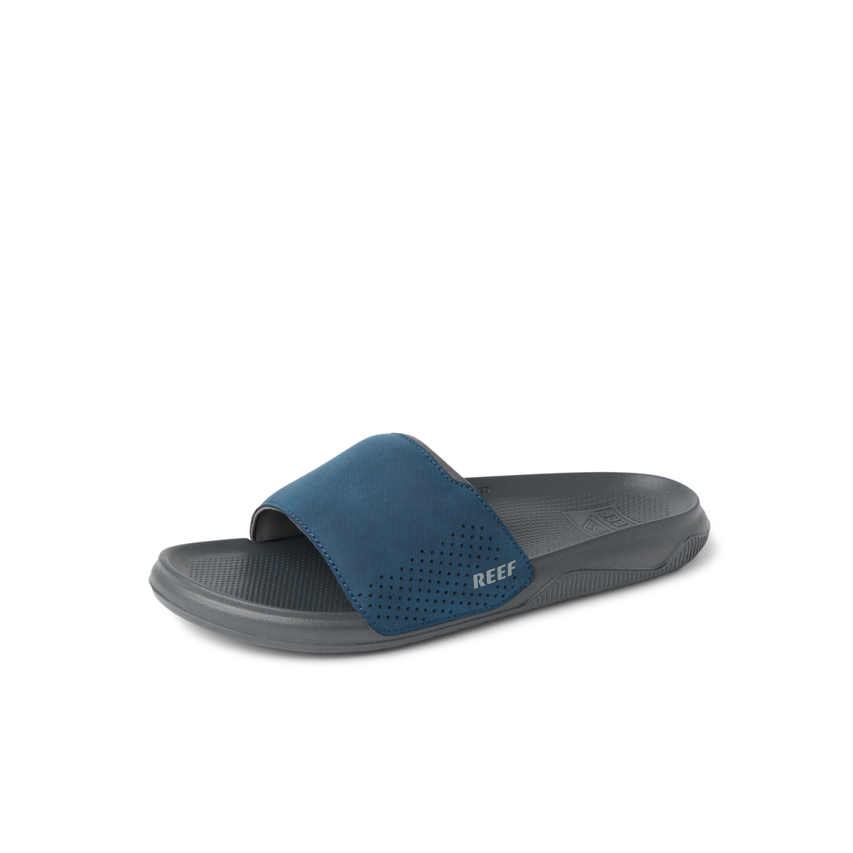 Tailslide men's slide facing left, blue strap with REEF logo, cushioned footbed for comfort, beach-inspired design.
