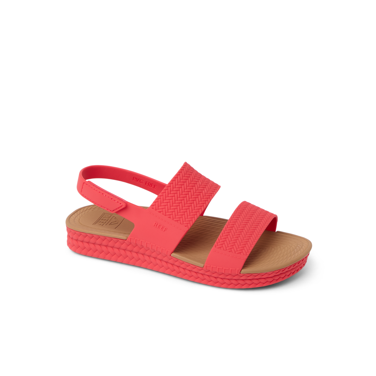Reef Water Vista women's coral sandal facing right, close-up of the sandal's side with cushioned sole and straps.