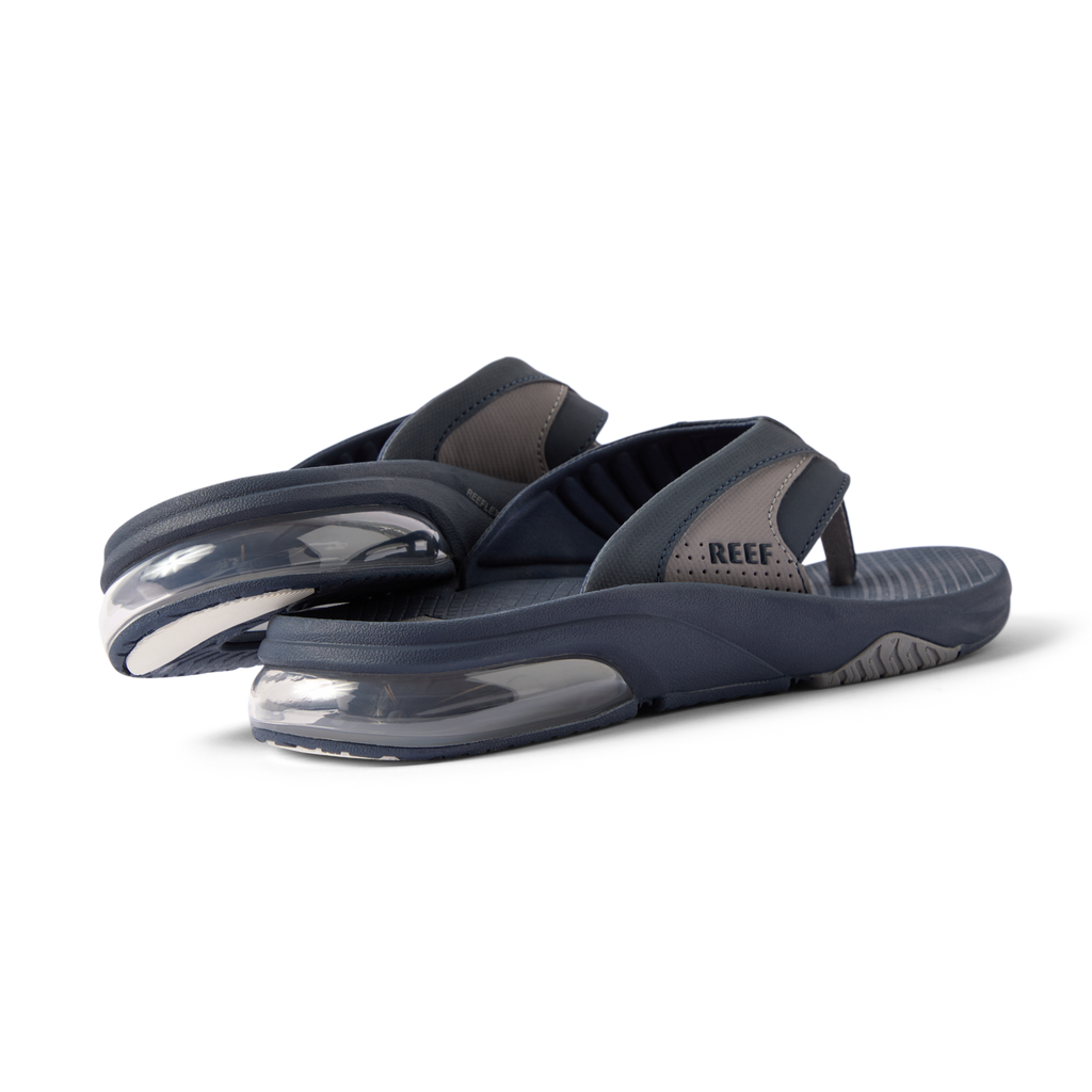 Pair of men's Fanning + sandals facing left showing back and sole with cushioned heel and water-friendly materials