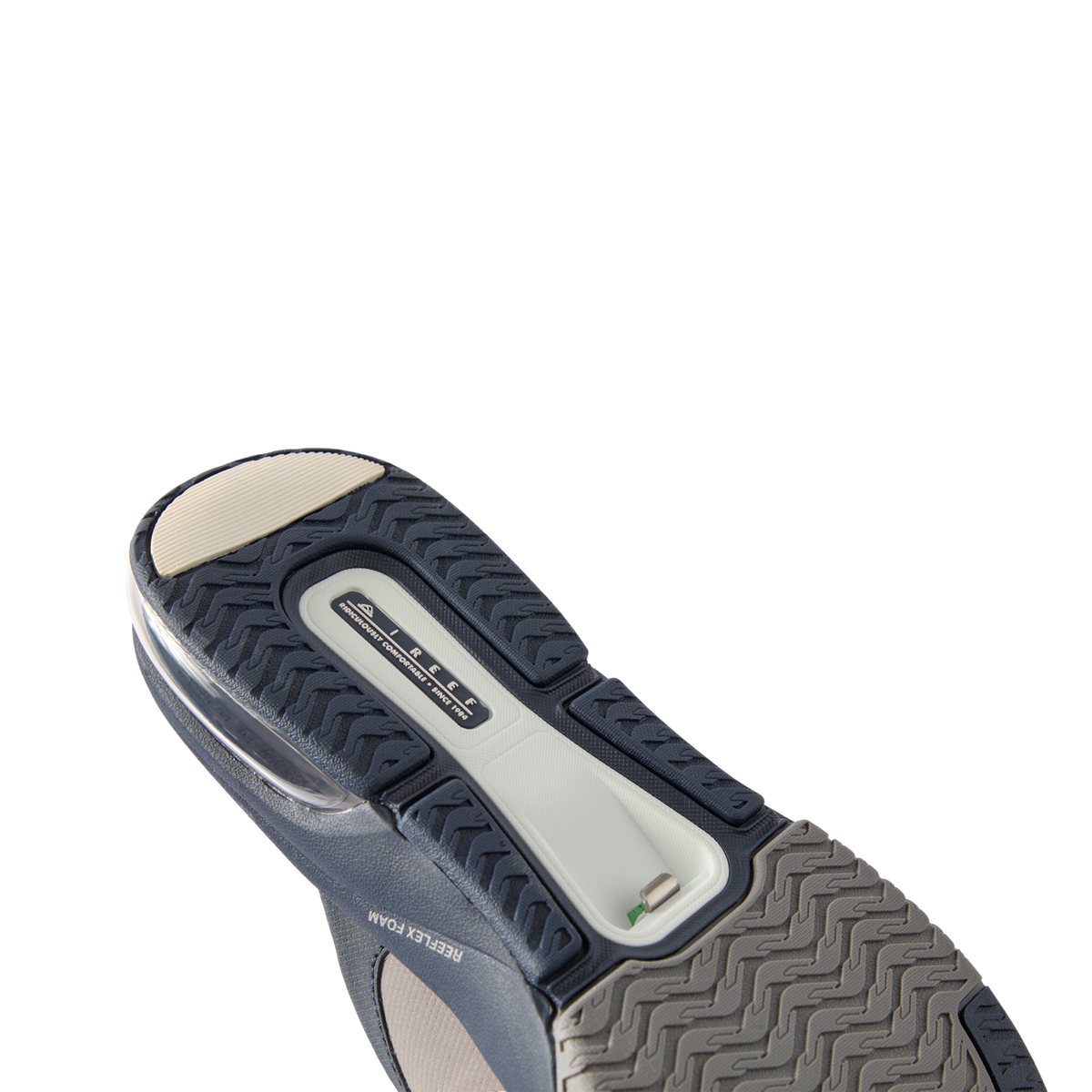 Fanning + men's shoe sole view facing up showing durable, water-friendly REEF design with arch support and cushioning