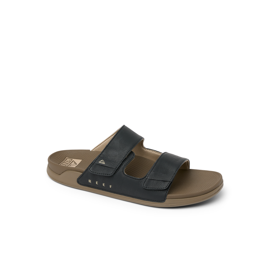 Phantom Tradewind men's sandal facing left, showing side with cushioned surf-inspired footbed and adjustable straps.