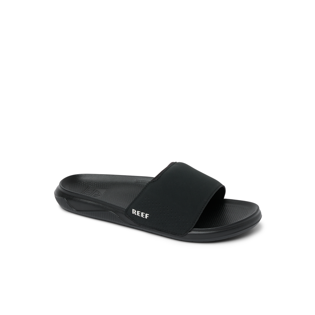 Tailslide men's black slide facing right showing top and side with arch support, water-friendly beach-inspired design