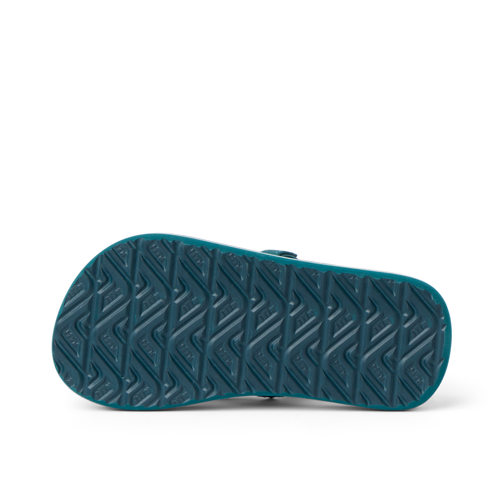 Little Ahi boys sandal showing the bottom sole with durable, water-friendly tread pattern facing up.