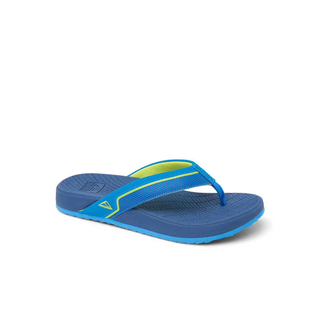 Kids Windswell blue and green flip flop facing left, close-up of side and top showing cushioned footbed and arch support.