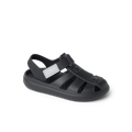 Little Totally Beachin black sandal facing right, showing soft-rebound cushioning and arch support for comfort.