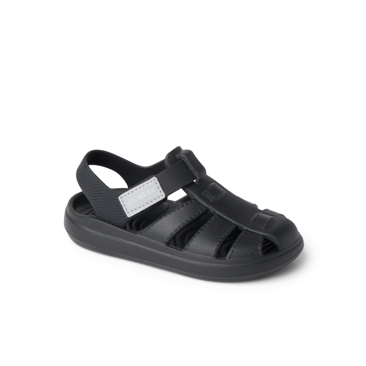 Little Totally Beachin black sandal facing right, showing soft-rebound cushioning and arch support for comfort.