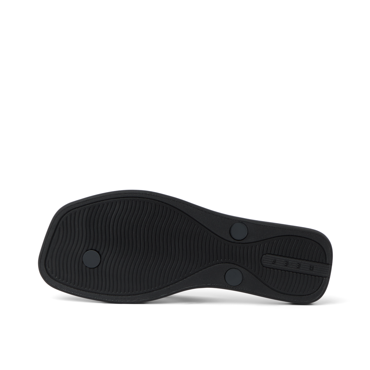Solaye women's black sandal outsole facing up, showing textured water-friendly sole with REEF branding.