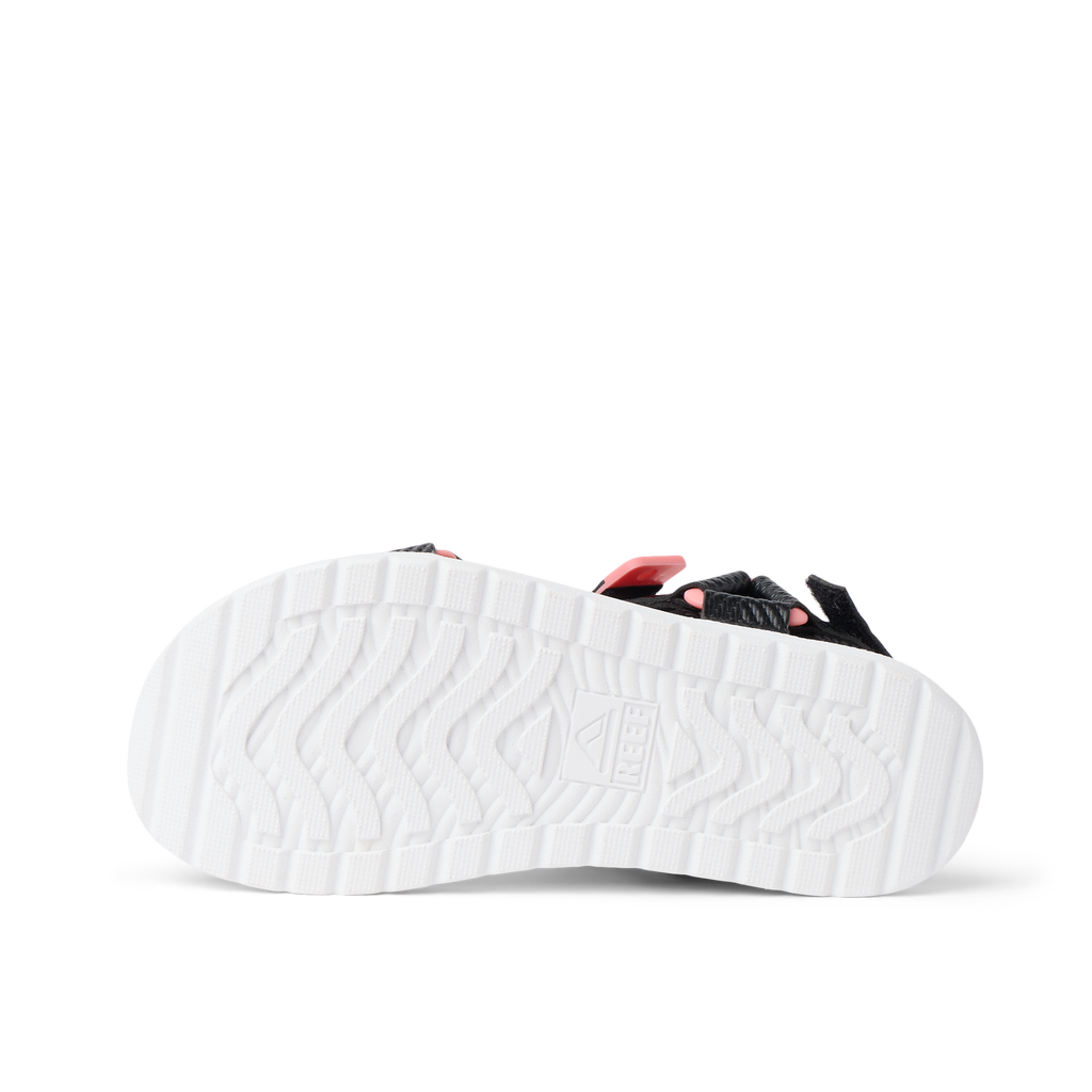 Kids Shoremazing sandal showing the bottom sole facing up, featuring durable, water-friendly, beach-inspired design.