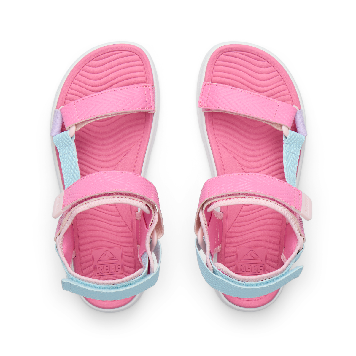 Top view of pink and blue Kids Shoremazing sandals for girls with anatomical arch support and cushioned footbed.