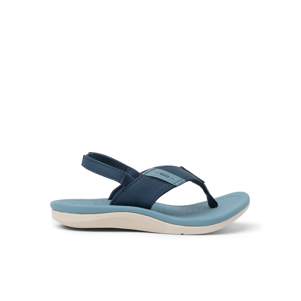 Little Santa Ana boys’ blue sandal facing left with adjustable strap, anatomical arch support, and cushioned sole.