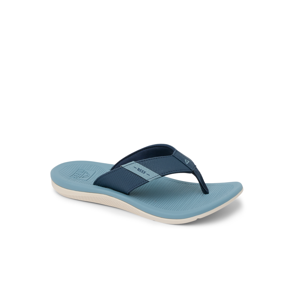 Kids Santa Ana flip flop sandal facing left, showing blue faded color and soft-rebound cushioned footbed.