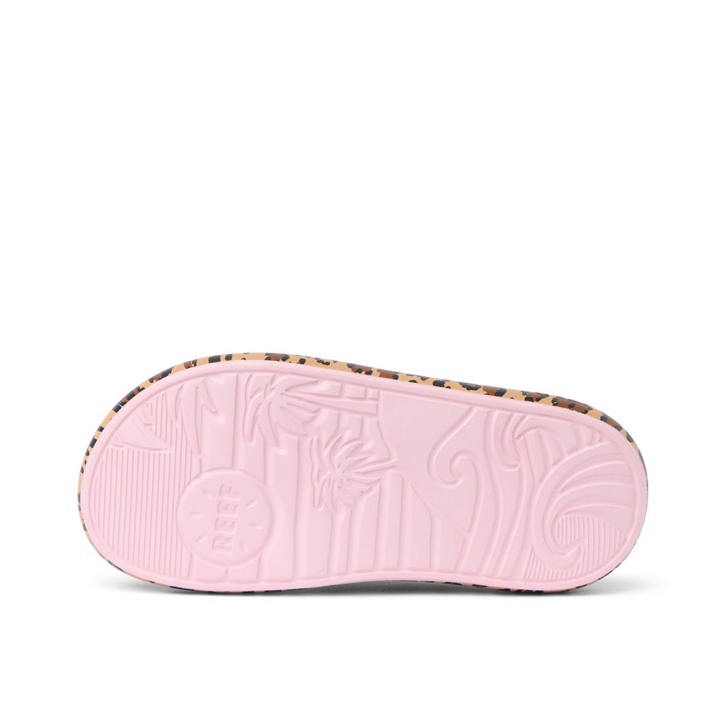 Kids Rio Slide showing sole facing up with tropical reef design, comfort-focused and water-friendly outsole for active kids.
