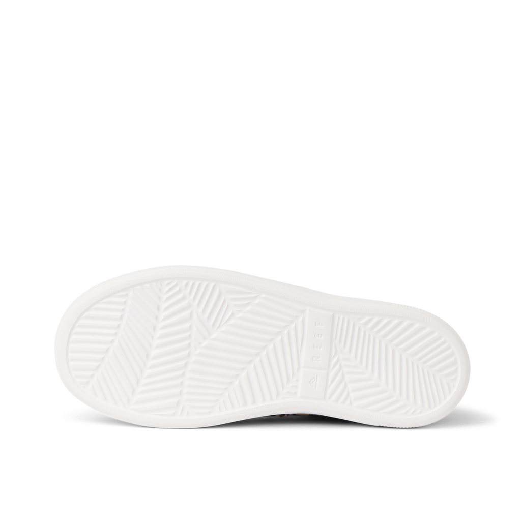 Kids Neptune shoe sole facing up, showing patterned outsole with anatomical arch support and water-friendly design.