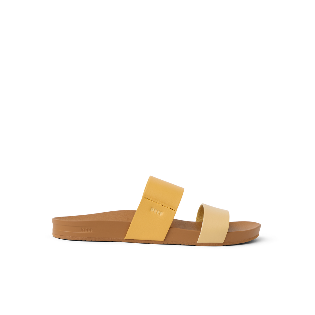 Cushion Vista women's sandal facing right with golden apricot straps, soft cushioning, and arch support for beach comfort.
