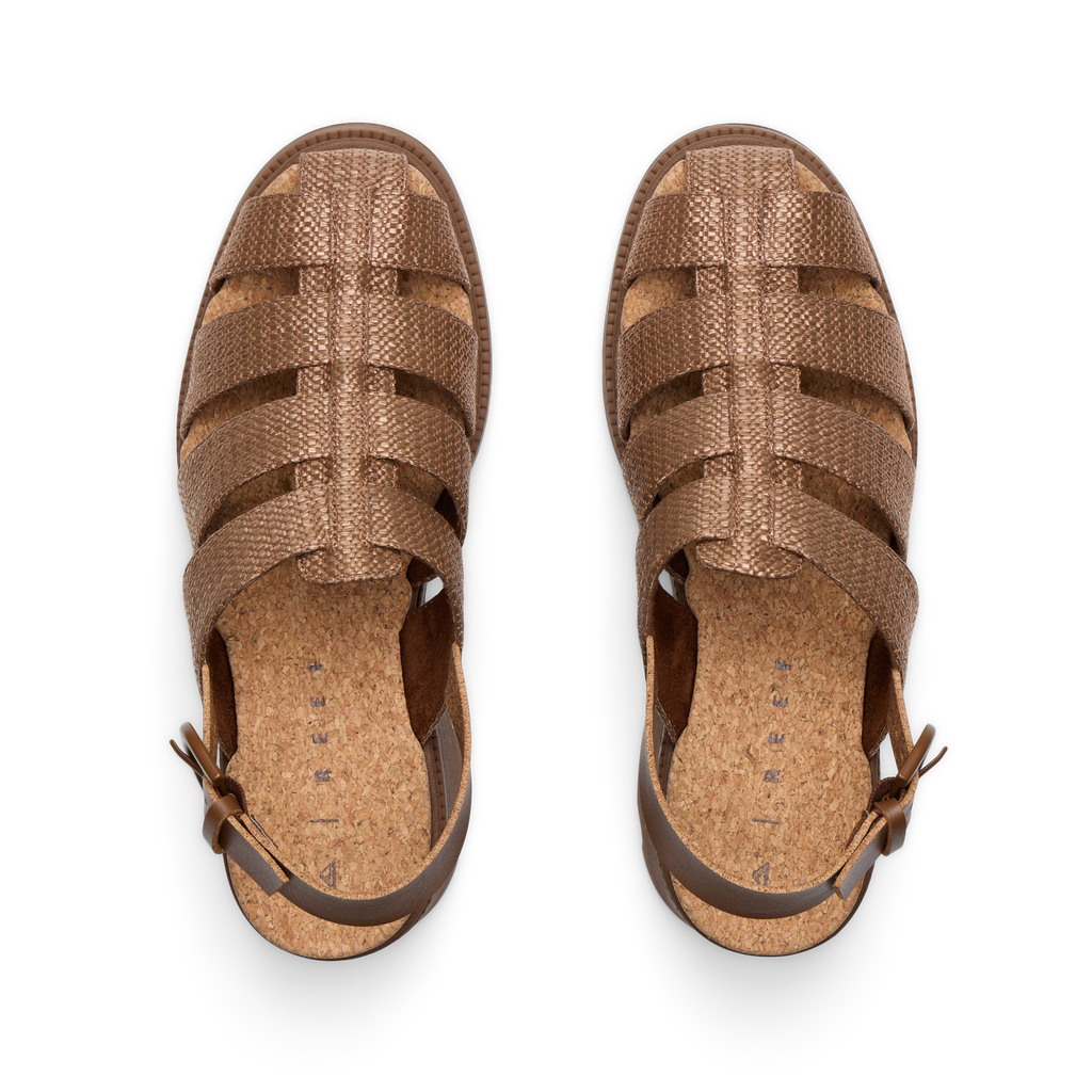Vista Luxe Lucie women's sandals facing up, showing cushioned footbed and chocolate raffia straps, designed for comfort and beach use.