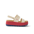 Side view of Water Vista Higher women's sandal with thick red platform sole and beige straps, surf-inspired comfort footwear.