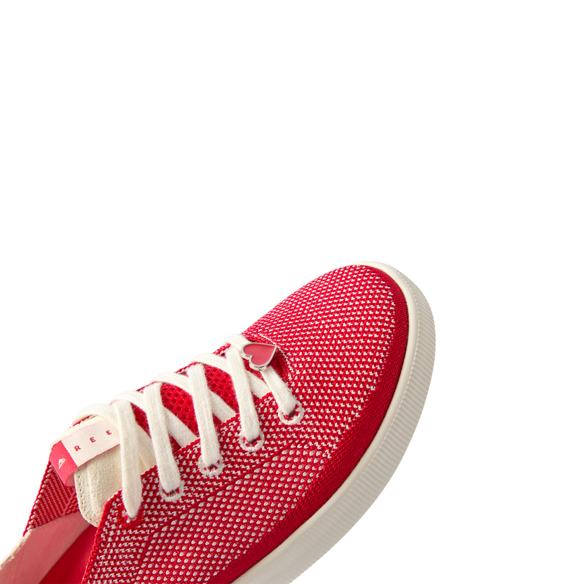 Close-up of the right Reef Neptune shoe facing left, red and white mesh sneaker with cushioned arch support.