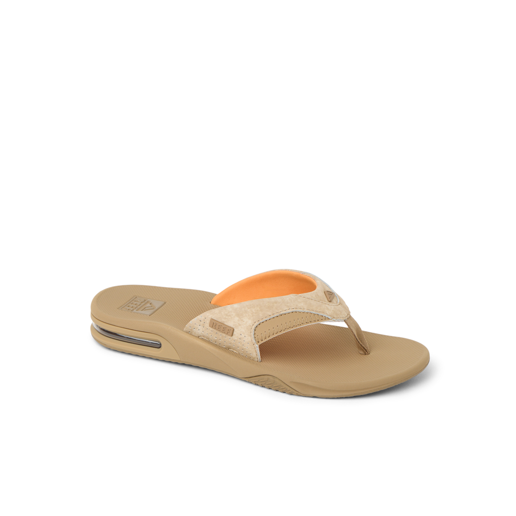 Fanning men's tan flip flop facing right showing cushioned arch support and soft-rebound footbed for beach comfort.