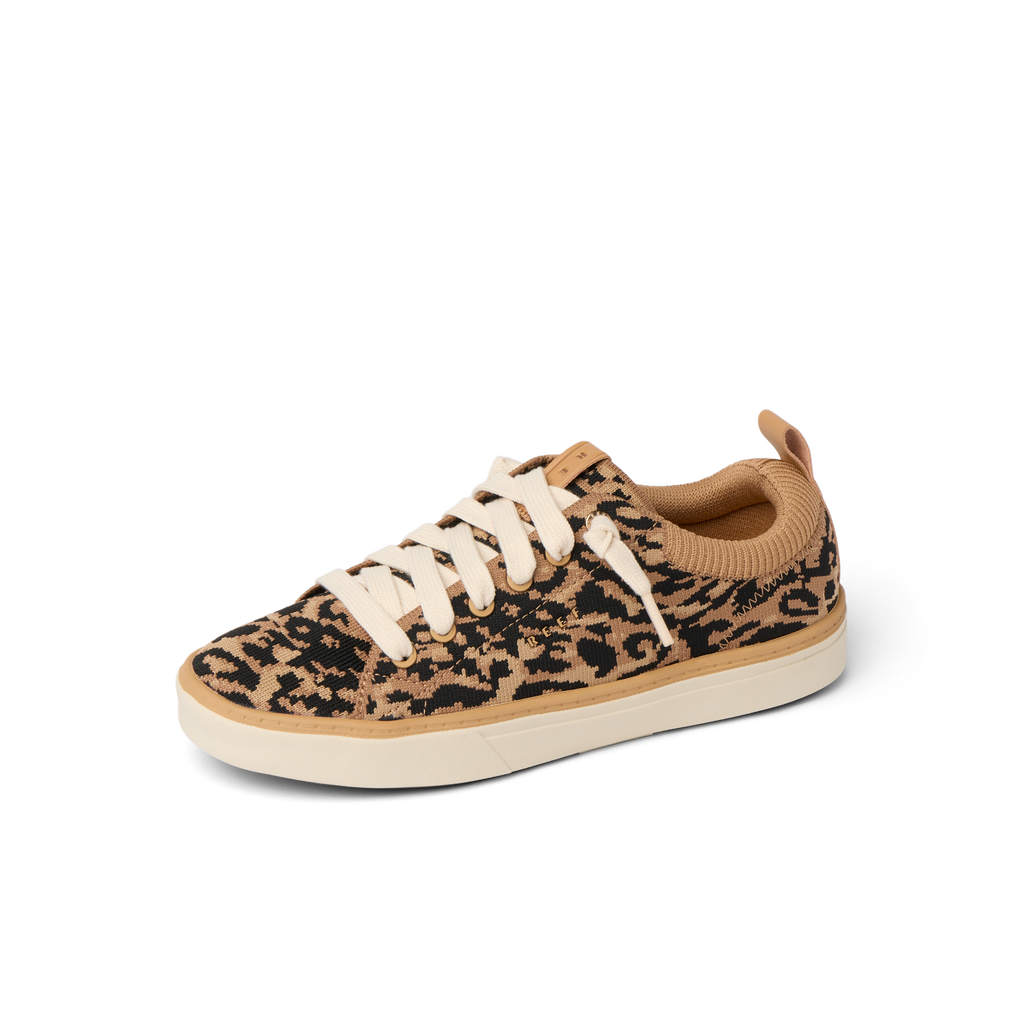 Lay Day Lite women's sneaker facing right with leopard pattern, soft cushioning, and anatomical arch support for all-day comfort.