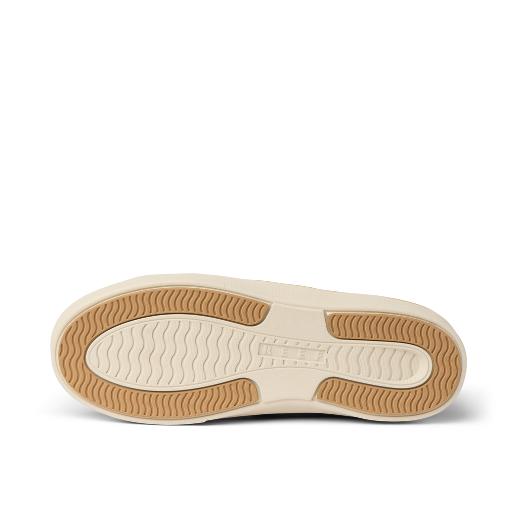 Lay Day Lite women’s shoe outsole facing up, showing durable, water-friendly textured sole for beach comfort.