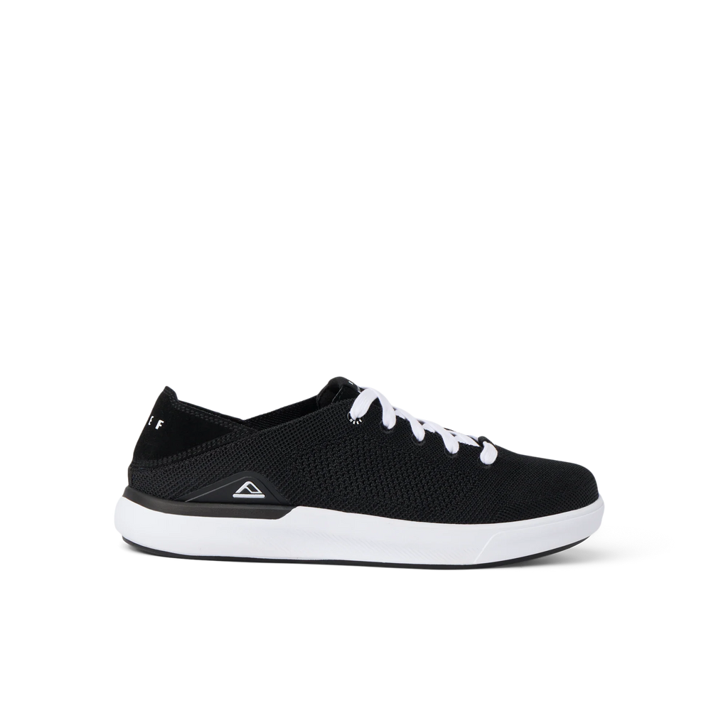 Neptune HT men's black sneaker facing right, showing lightweight knit upper with cushioned white sole, surf-inspired comfort design.